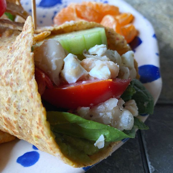 Vegetarian white bean wraps with feta & guacamole