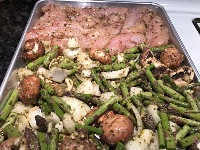 pesto chicken on the pan