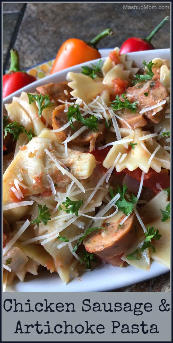 Easy weeknight chicken sausage and artichoke pasta with Parmesan cheese and tomatoes