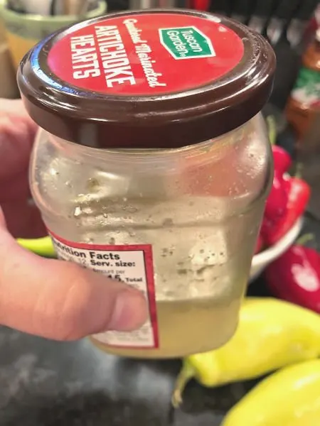 leftover artichoke marinade in a jar