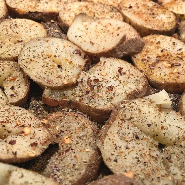 seasoned potatoes in a pan