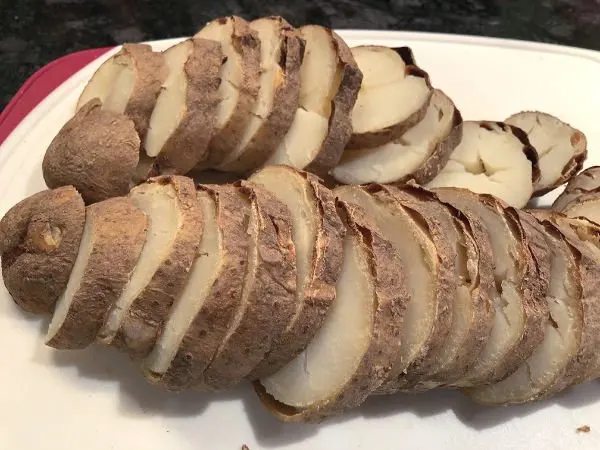 slice up baked potatoes