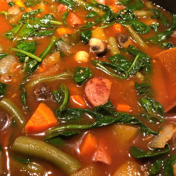 wilt in spinach to harvest veggie stew