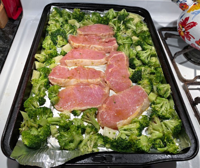 arrange pork chops and broccoli on a prepared baking sheet and then broil