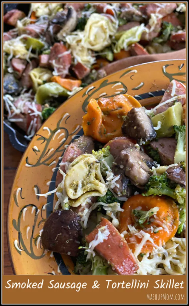 Smoked sausage & tortellini skillet with pesto and Parmesan is an easy 30 minute weeknight dinner recipe.