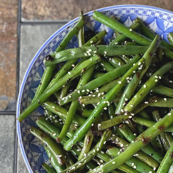 plate of garlic and soy green beans