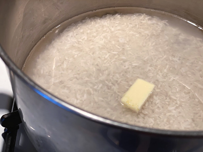 Add butter to the rice