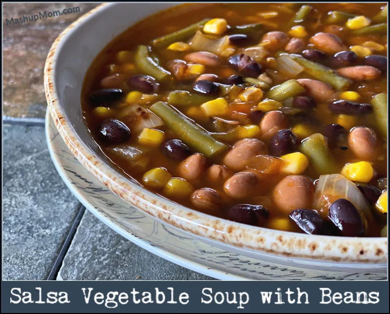 Salsa Vegetable Soup With Beans is an easy vegetarian pantry recipe that comes together in just 30 minutes! Full of flavor, this quick pantry basics soup is perfect for Meatless Monday.