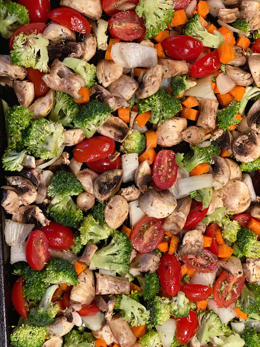 Pan of vegetables ready to roast in the oven