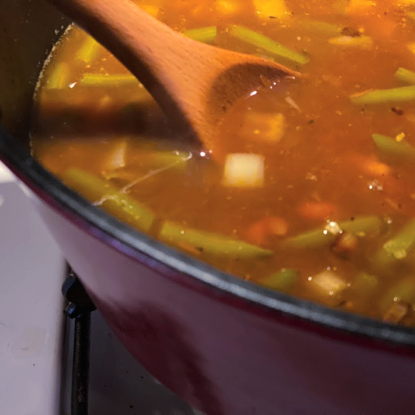 Pot of vegetable soup with  beans