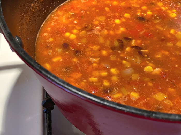 finished chicken taco soup in a pot on the stove