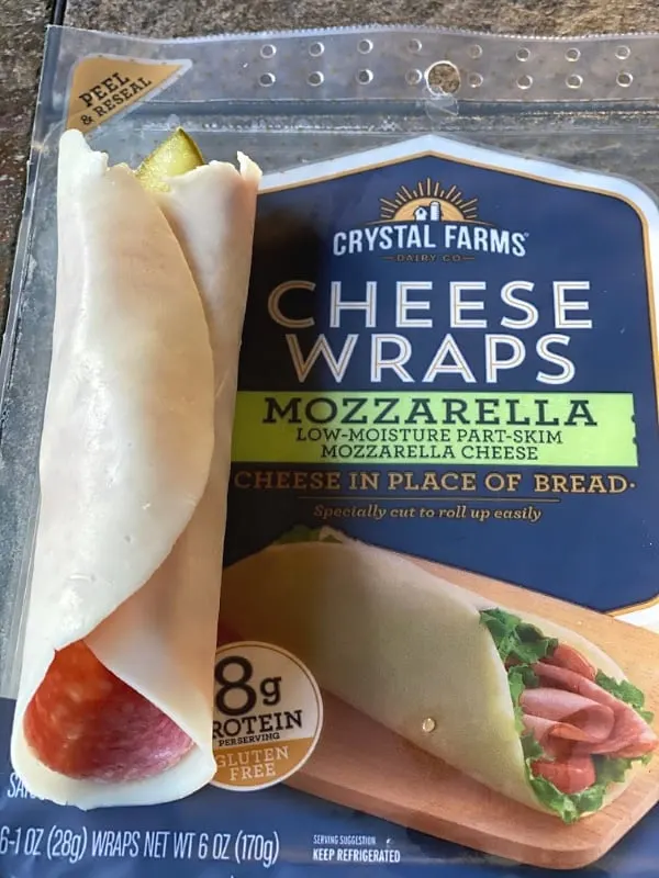 Crystal Farms Cheese Wraps with salami and a pickle