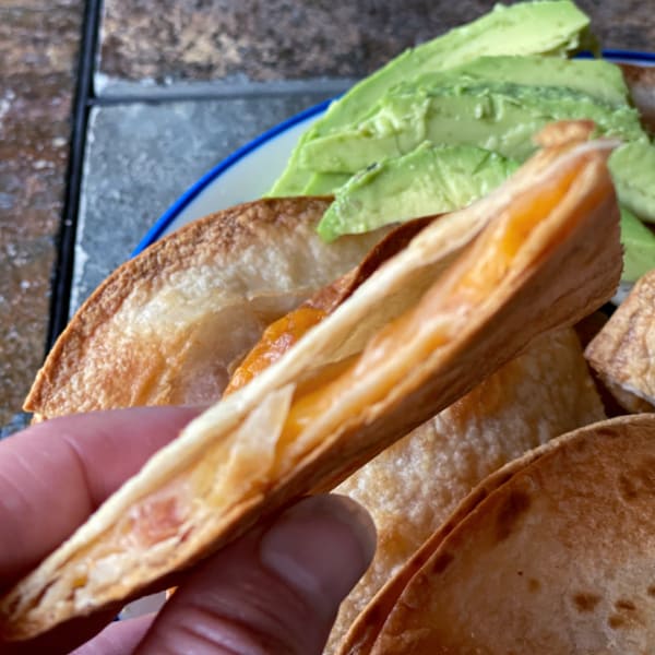 Inside a ham and cheese quesadilla