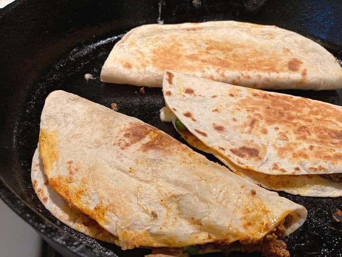 brown the quesadillas in the pan