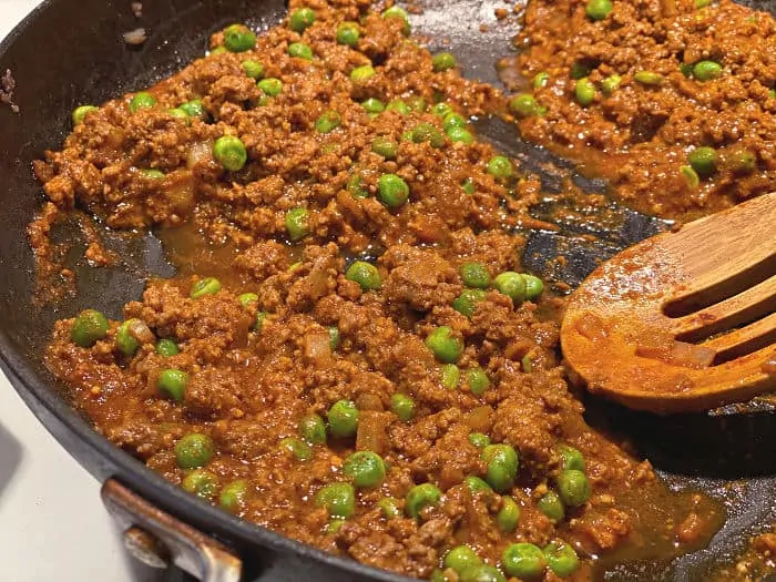 divide the meat into quarters in the pan