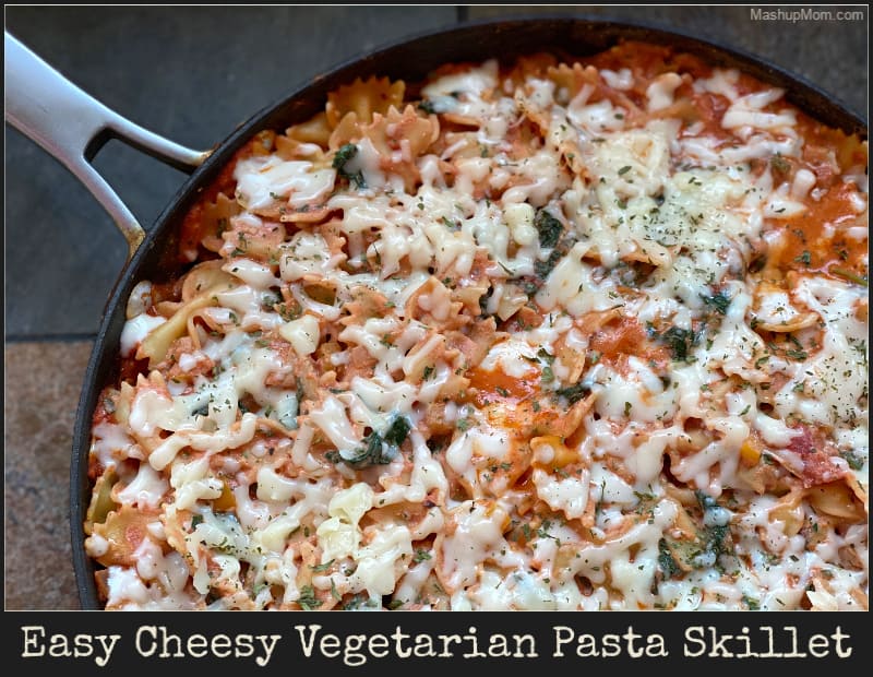 Meatless Monday is now the best night of the week! Easy Cheesy Vegetarian Pasta Skillet has it all -- artichokes, mushrooms, sweet bell pepper, onion, and spinach, all nestled together in a beautifully cheesy pan full of pasta. Tastes like lasagna, but with a fraction of the effort.