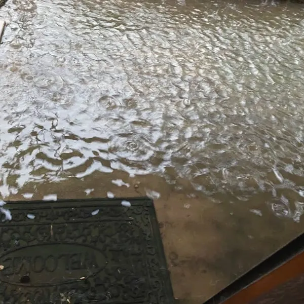 rain flooding a patio