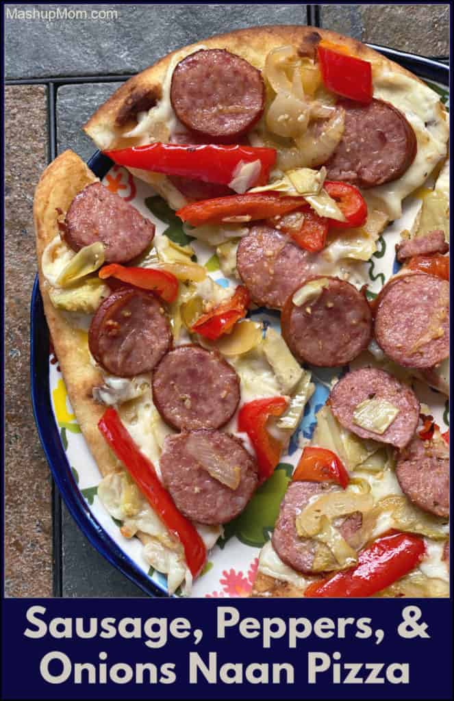 Well, isn't this just a fun little flavor explosion of a recipe mashup. Sausage, Peppers, & Onions (plus artichoke!) Naan Pizza drops a classic flavor combo onto a chewy flatbread crust, then punches everything up with tangy artichokes and smooth mozzarella.