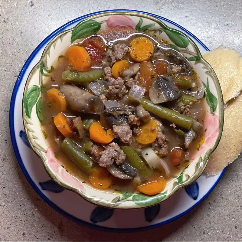 bowl of ground beef stew with vegetables