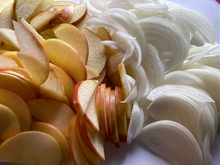 thinly slice the apples and onion