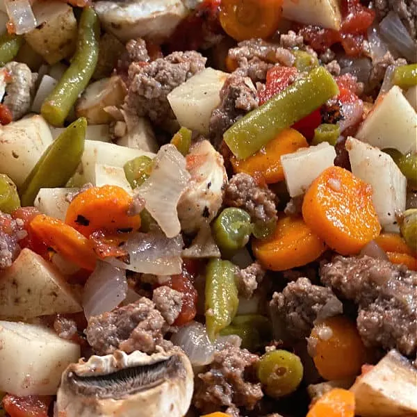 stir veggies into the beef