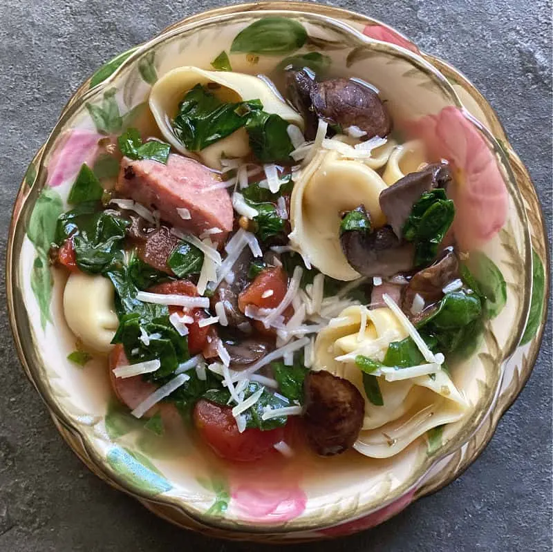 Bowl of kielbasa tortellini soup, done in 30 minutes!