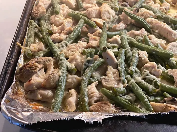 finished sheet pan chicken dinner with Parmesan