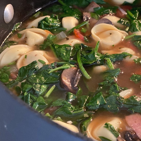 pot of kielbasa soup with tortellini