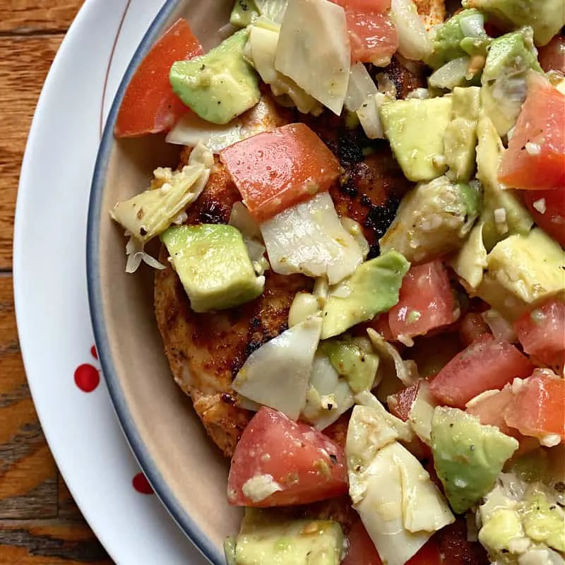 skillet chicken tenders with artichoke avocado salsa