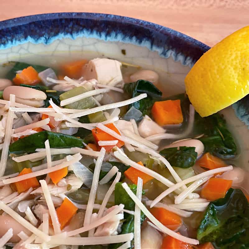 tuscan style chicken and white bean soup with Parmesan and lemon