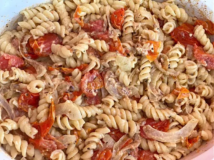 cheesy tomato pasta in a casserole dish