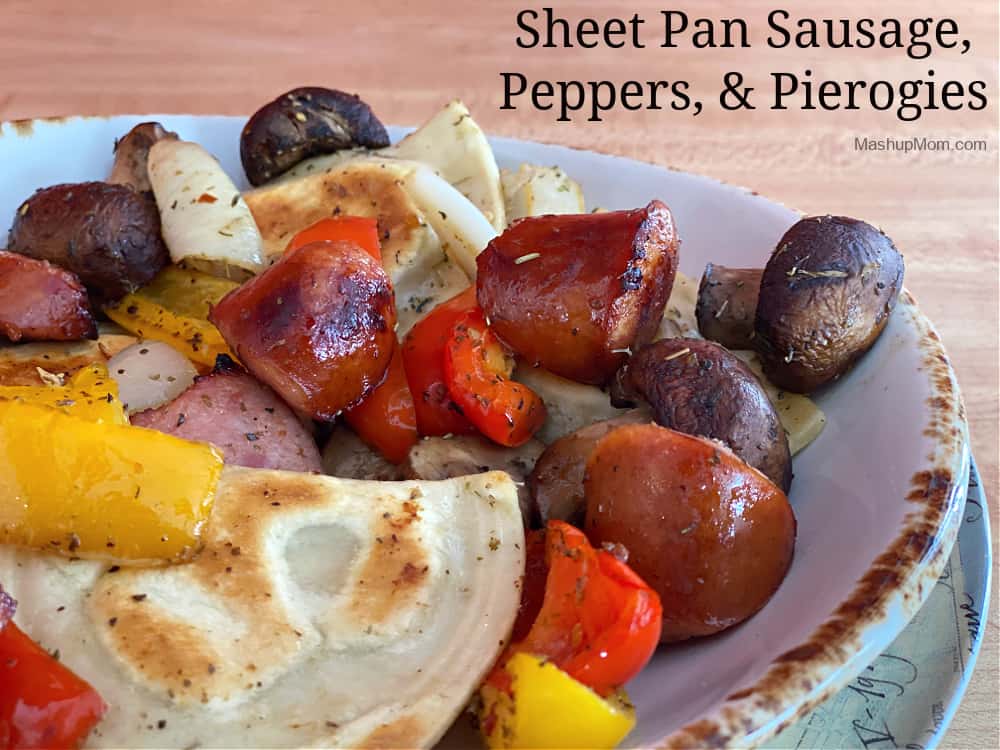 Sheet pan sausage, peppers, & pierogies is an easy comfort food dinner idea.