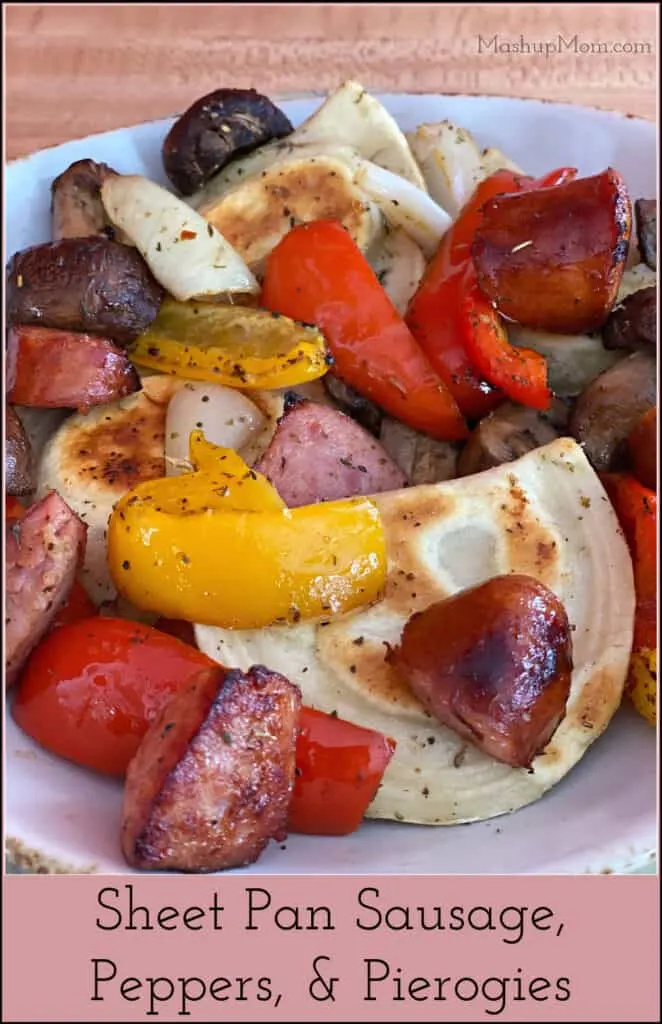 Sheet pan sausage, peppers, & pierogies is an easy comfort food dinner idea.