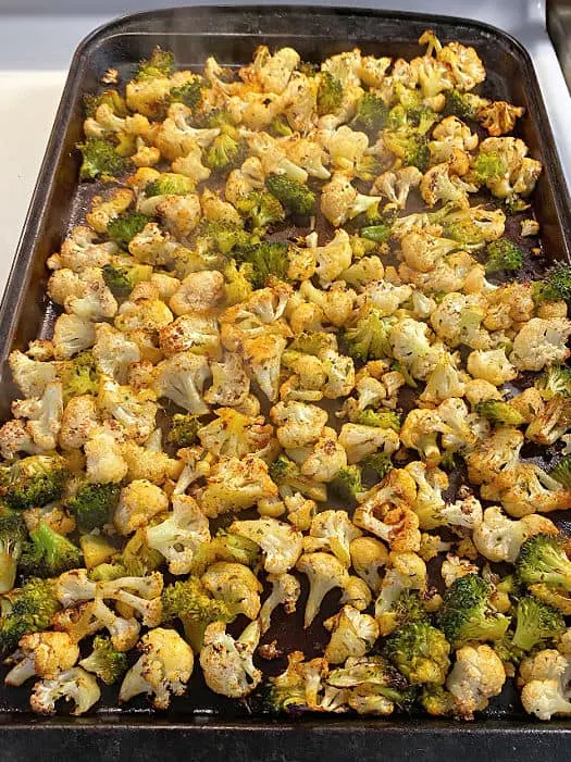sheet pan of roasted broccoli and cauliflower
