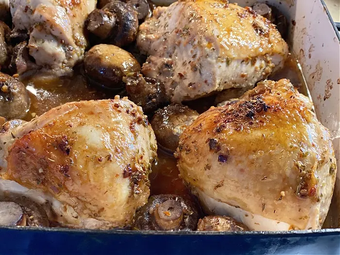 roasted chicken and mushrooms in the pan