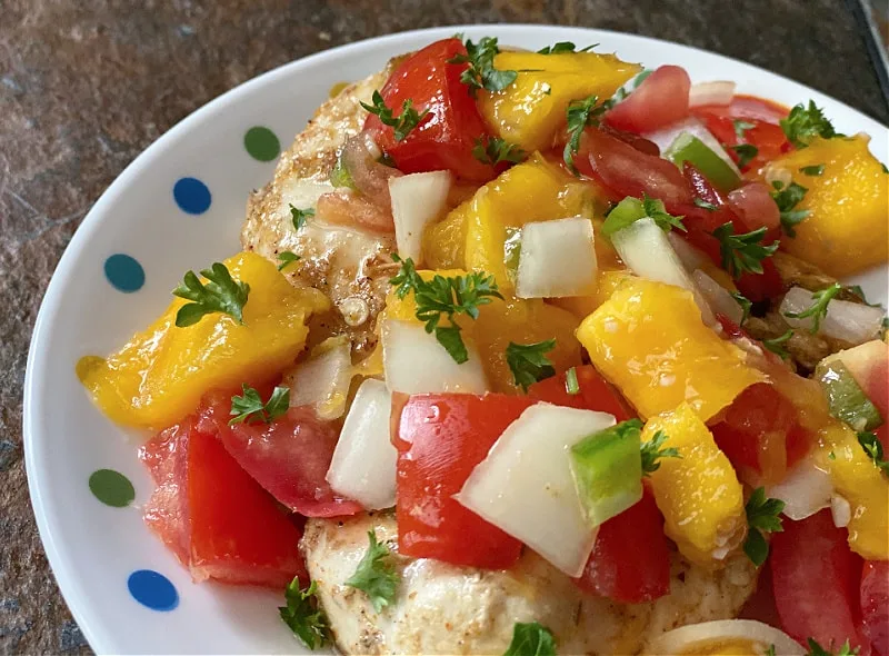 chicken topped with fresh salsa