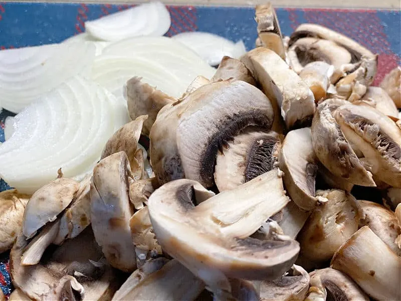 cut up mushrooms and onions for stir fry