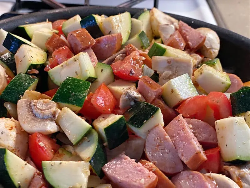 stir veggies into the skillet