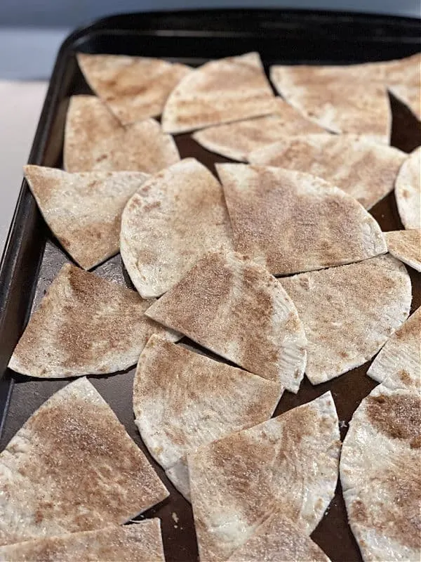 cinnamon sugar tortillas on a baking sheet