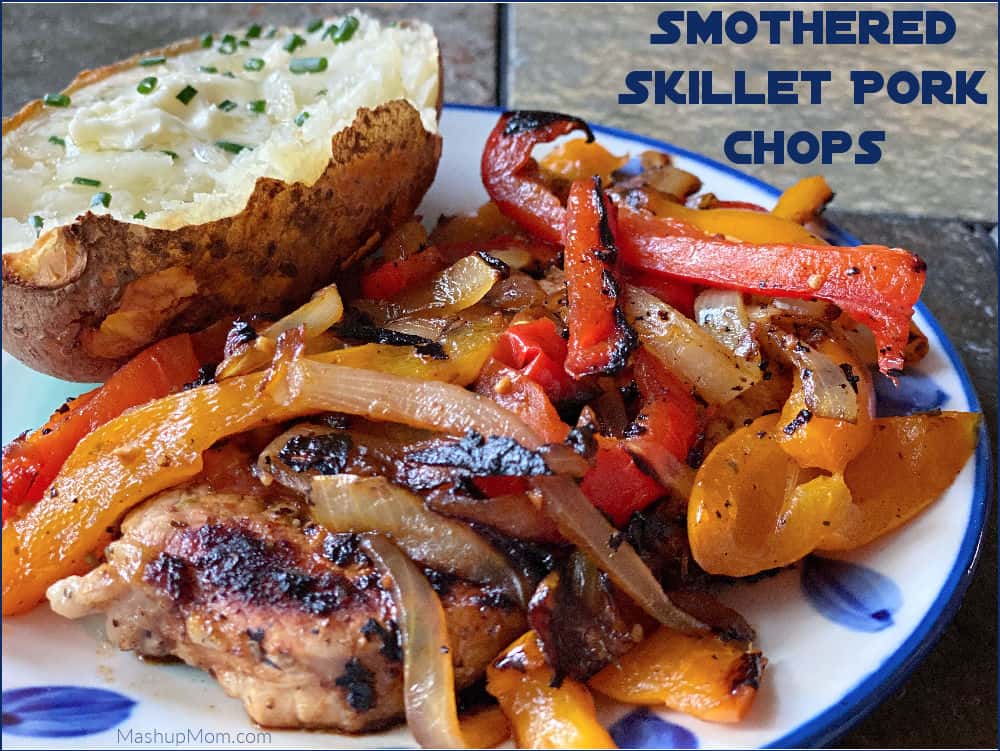 Smothered skillet pork chops marinate in Olive Garden dressing!