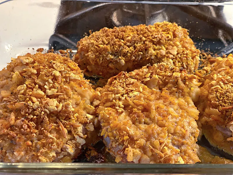 browned pork chops in baking dish