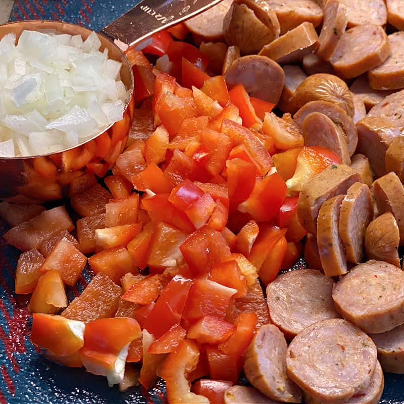 cut up onion pepper and sausage