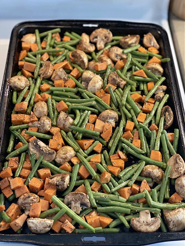 spread out veggies on a baking sheet