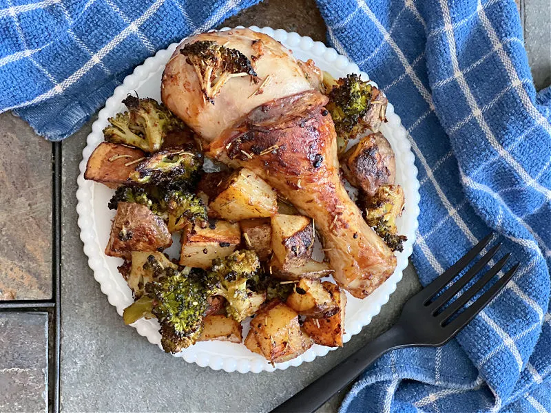 Plate of chicken with broccoli and potatoes