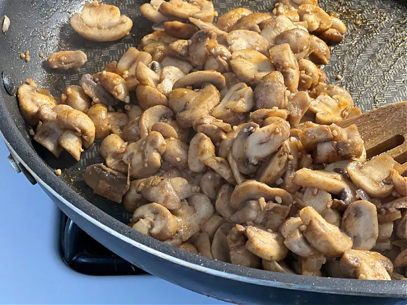 sauteed mushrooms in a skillet