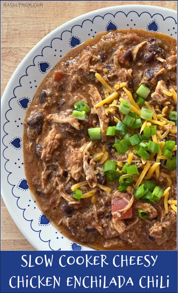 bowl of cheesy chicken chili with green onions