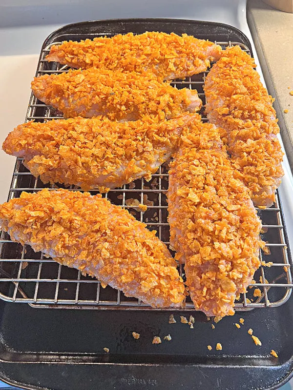 potato chip breaded fish on baking rack