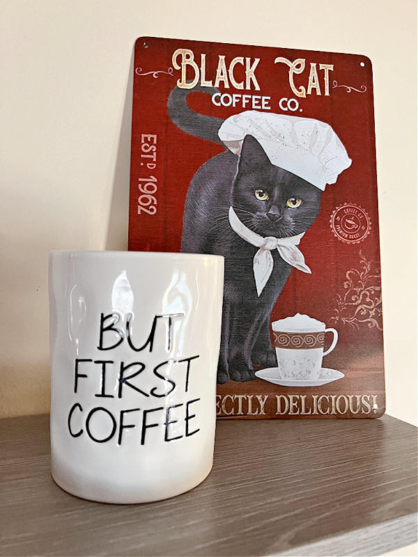 coffee candle and coffee cat sign