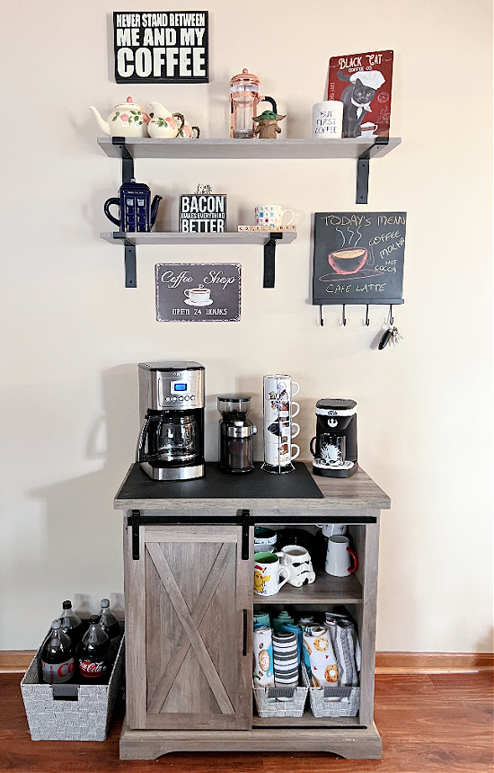 Stylish Coffee Bar with Chalkboard, Black Cabinets, and Floating