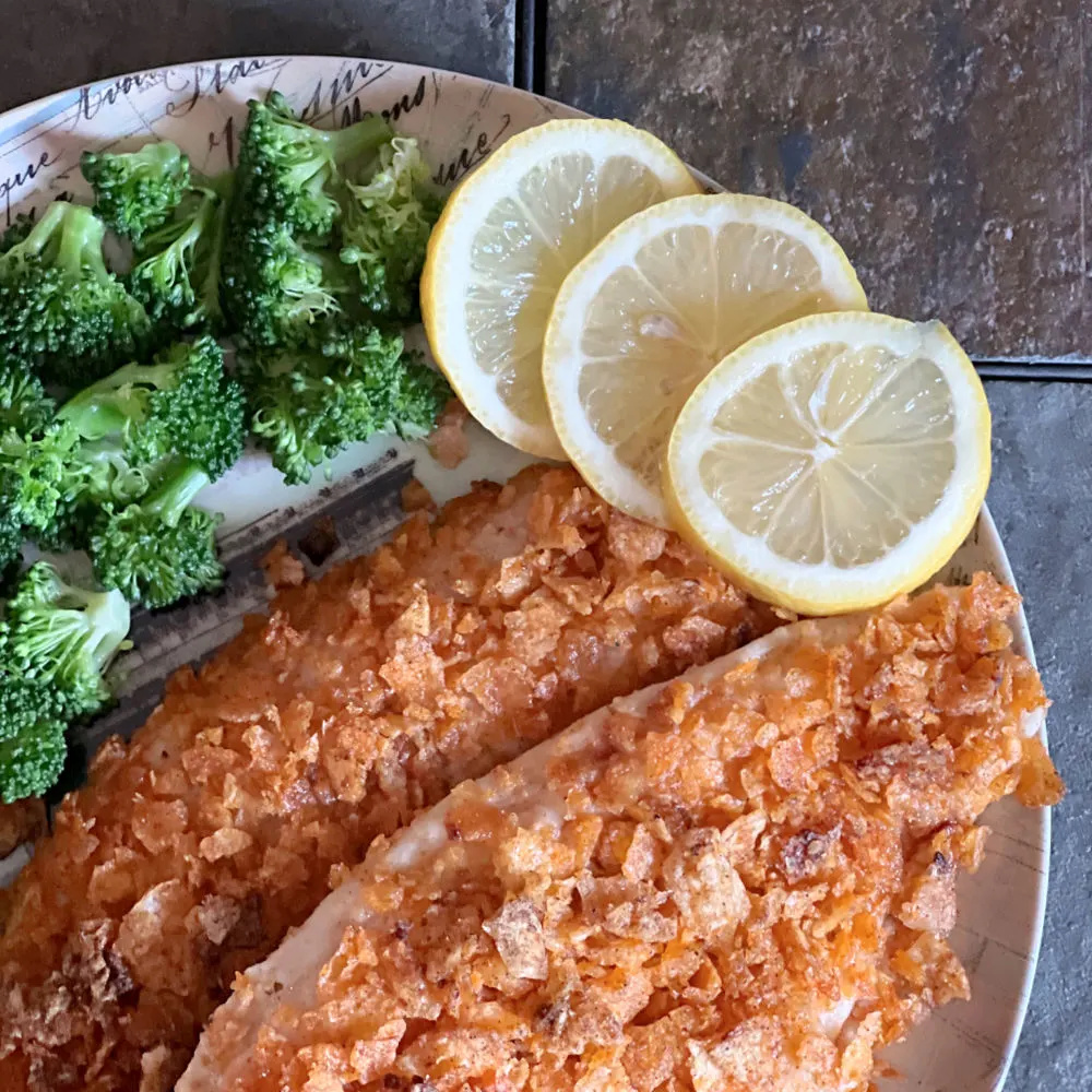 fish with lemons and broccoli